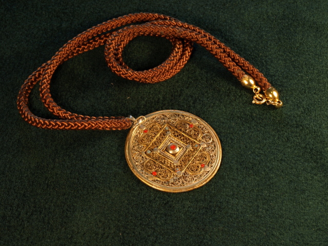Tibetan pendant with rope